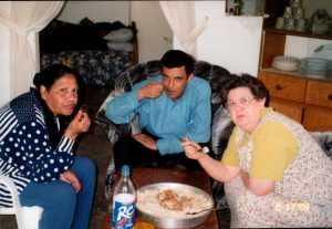 Fotma, Nasser and Jan at an engagement party.