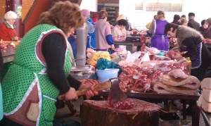 Notice how they are cutting the meat.