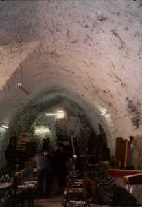 Note the beautiful handcrafted furniture in the furniture factory.