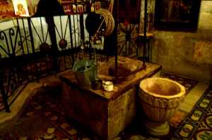 Note the bucket sitting on the side to bring the water up.