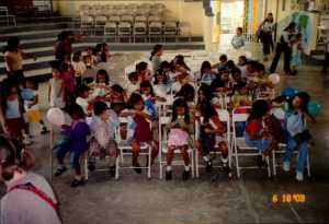 Handing out school supplies